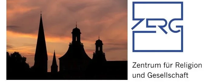 Eine Wissenschaftlerin und ein Wissenschaftler arbeiten hinter einer Glasfassade und mischen Chemikalien mit Großgeräten.